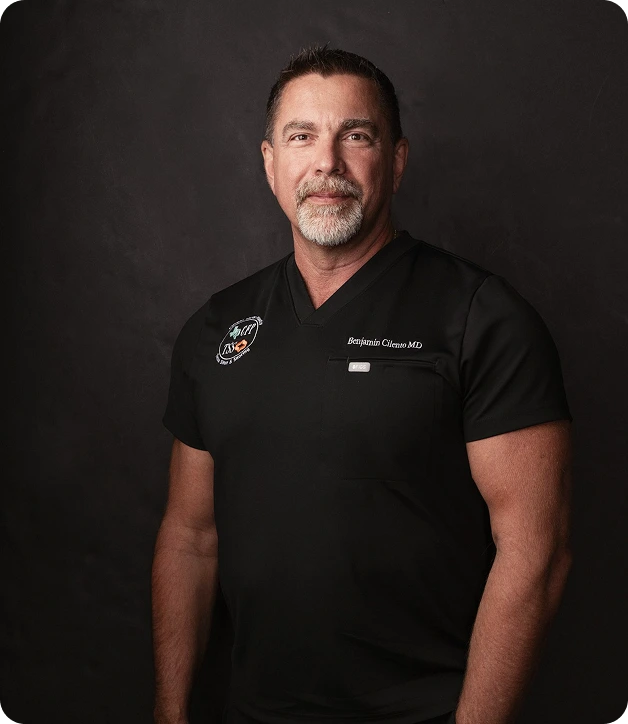 Dr. Benjamin Gibson wearing black medical scrubs